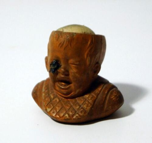 A 19thC French terracotta dolls's head