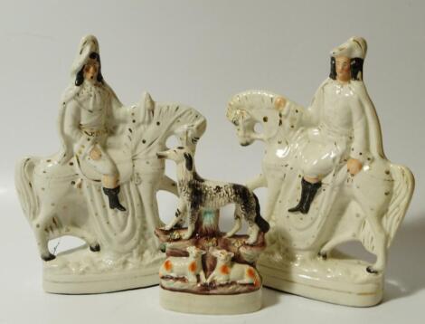 A pair of 19thC Staffordshire equestrian group figures