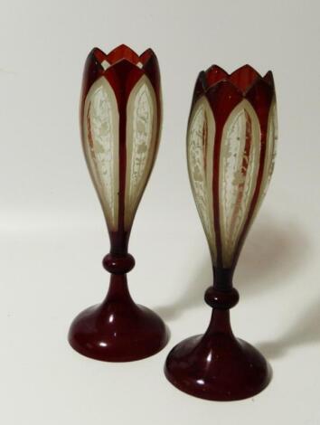 A pair of 19thC Bohemian ruby clear and etched glass vases