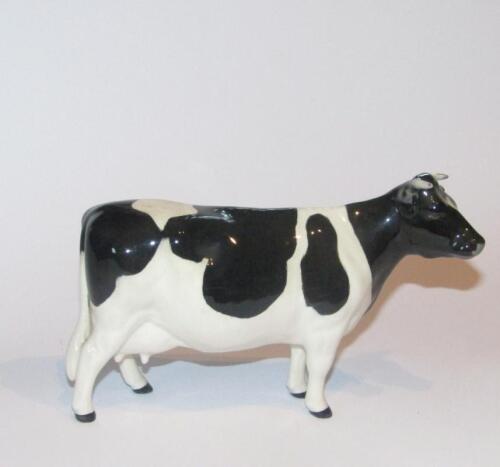 A 20thC Beswick pottery Friesian cow