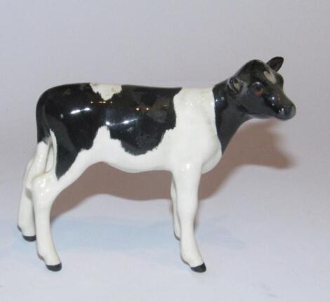 A 20thC Beswick pottery Friesian calf