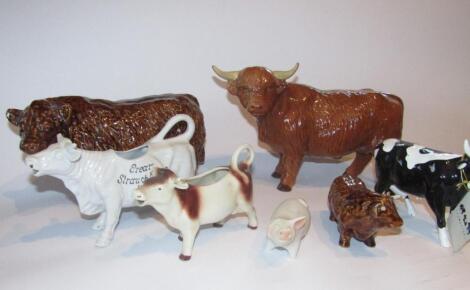 Various 20thC pottery figures of cattle