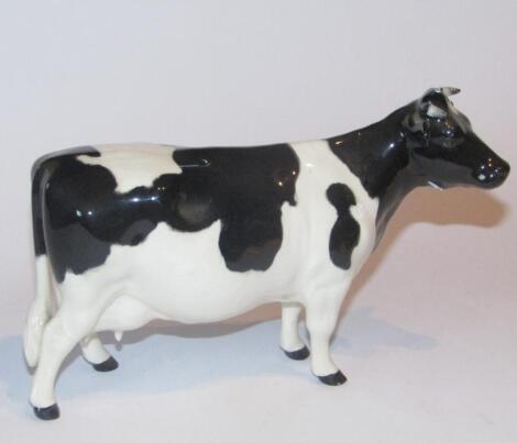 A Beswick pottery Friesian cow