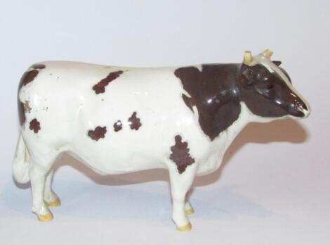 A 20thC Beswick pottery Ayrshire bull