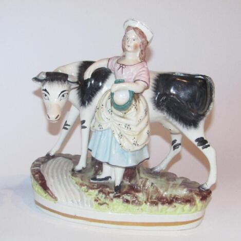 A 19thC Staffordshire milkmaid group