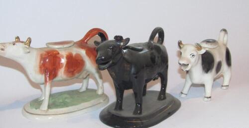 A 19thC Staffordshire cow creamer