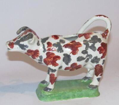 A late 18thC Yorkshire creamware cow creamer