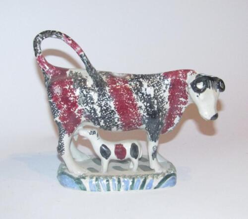 A late 18thC Leeds Prattware cow creamer and calf group