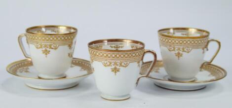 Three Russian porcelain tea cups and two saucers