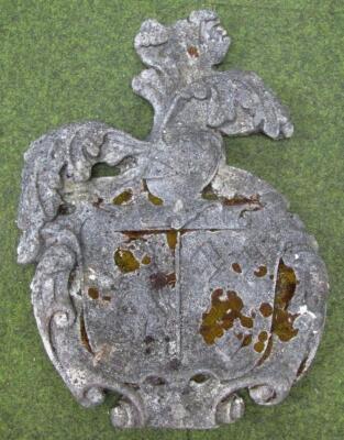 A carved stone coat of arms