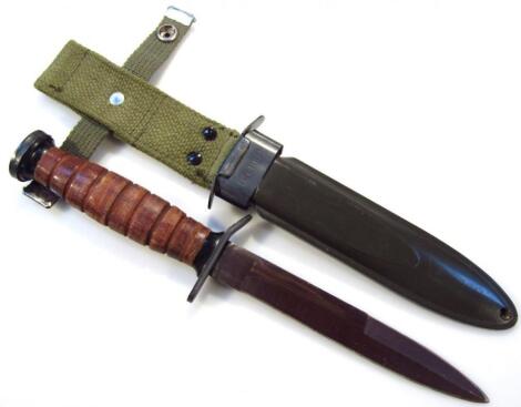 A 20thC US M8A1 dagger bayonet and scabbard