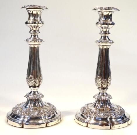 A pair of silver plated candlesticks