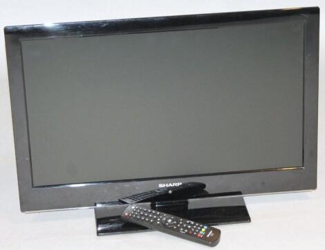 A Sharp 23" colour television