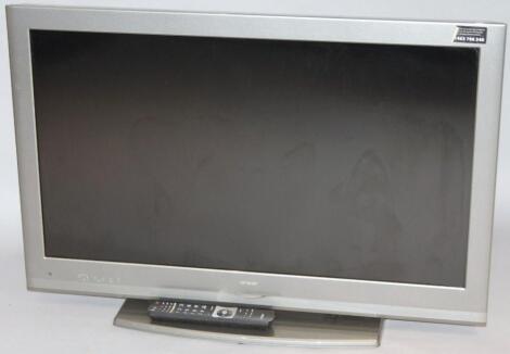 An Unsar 36" colour television