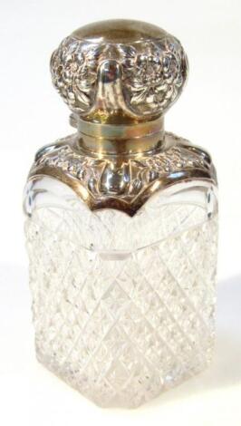 An early 20thC cut glass perfume bottle