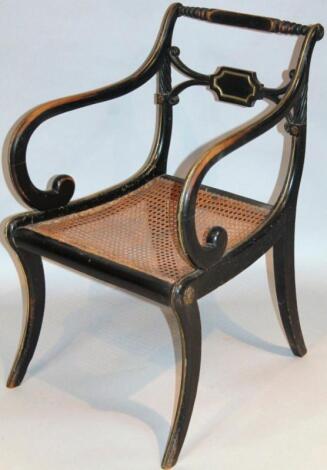 An Regency ebonised carver chair