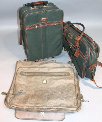 A Harrods green velvet suitcase