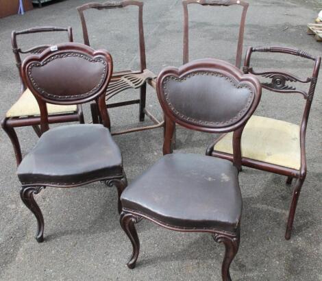 A pair of Regency style mahogany dining chairs