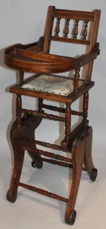 An Edwardian stained beech child's highchair