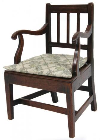 A 19thC mahogany child's carver chair