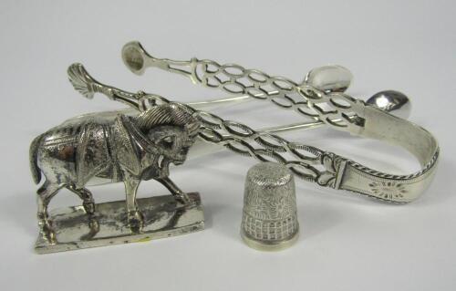 A pair of George III silver sugar tongs