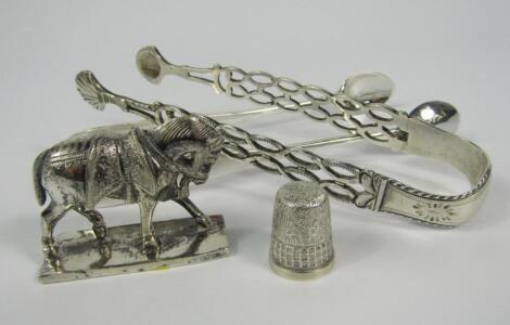 A pair of George III silver sugar tongs