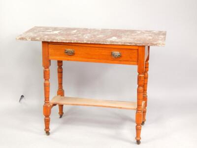 An Edwardian satin walnut washstand