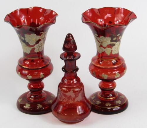 A pair of Bohemian ruby glass vases