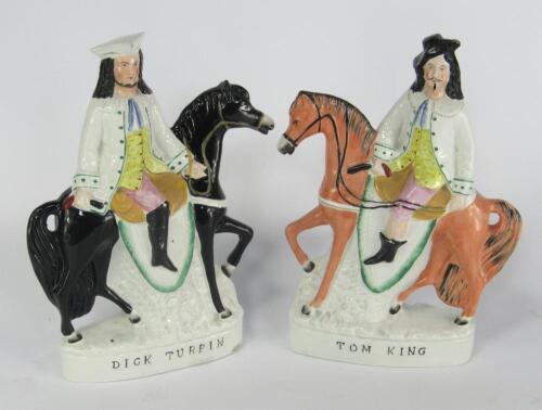 A pair of Staffordshire pottery flatback figures