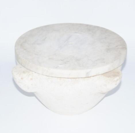 A marble mortar and cover