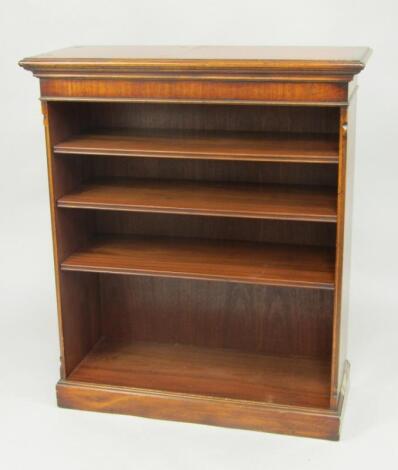 A mahogany open bookcase