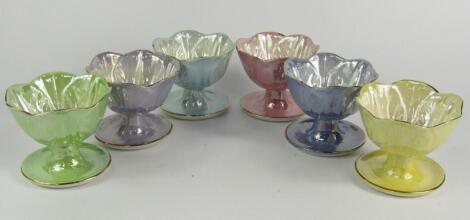 A set of six Maling vari coloured lustre leaf moulded grapefruit dishes