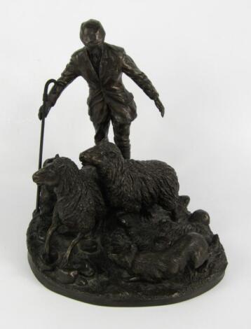 A Heredites bronzed sculpture of a shepherd and sheep