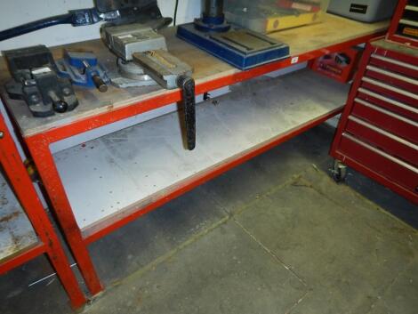 A metal framed work bench.