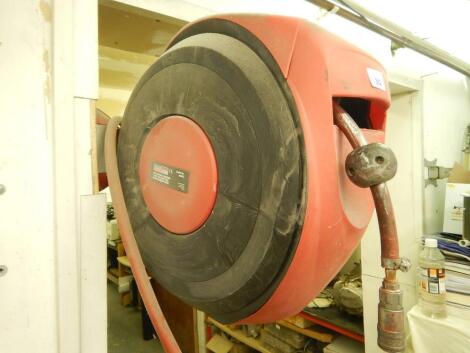 A Sealey autowind control 15 metre wall mounted hose reel.