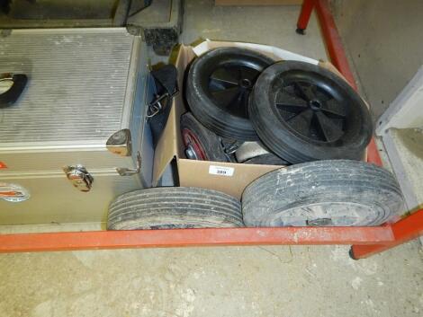 Various trolley wheels and an alloy tool case.