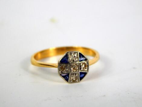 An Art Deco style yellow metal sapphire and diamond ring