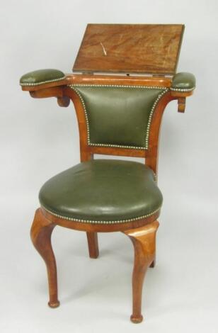 A George III style 'cock fighting' reading chair