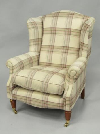 A Laura Ashley oak framed wing armchair