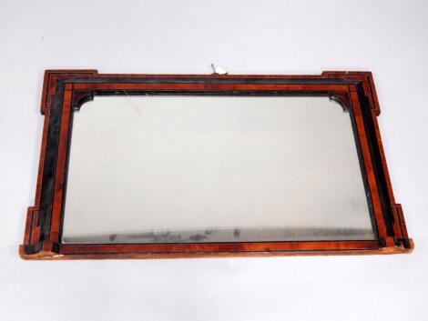 A Victorian walnut and ebonised overmantel mirror