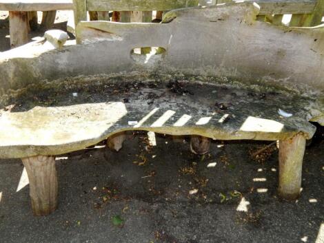 A two seater driftwood bench.