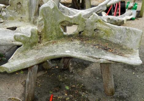 A single seater driftwood garden chair.