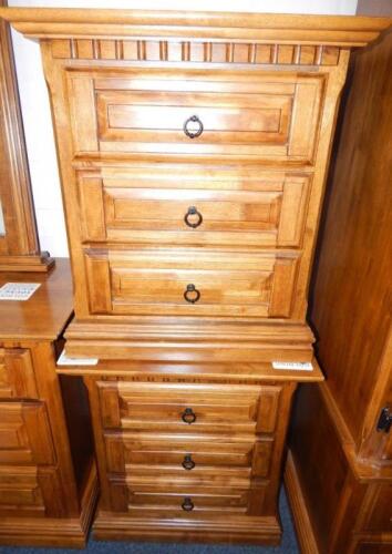 A pair of oak bedside chests