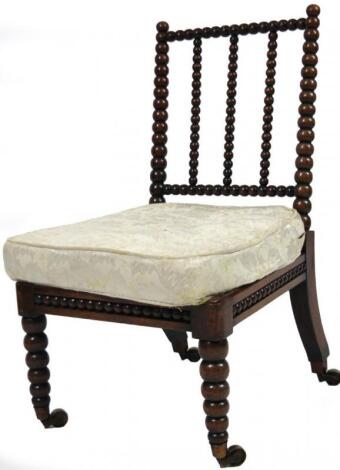 A Jacobean style walnut bobbin turned chair