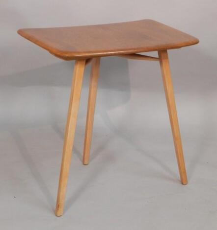 An Ercol light elm side table or table extension