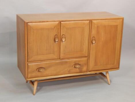 An Ercol light elm sideboard