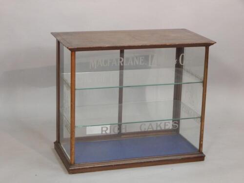 A late 19thC/early 20thC mahogany and glazed shop display cabinet