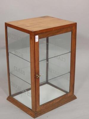 A late 19th/early 20thC glazed mahogany shop display cabinet