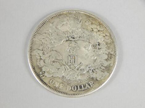 A Chinese 1911 one dollar silver coin.