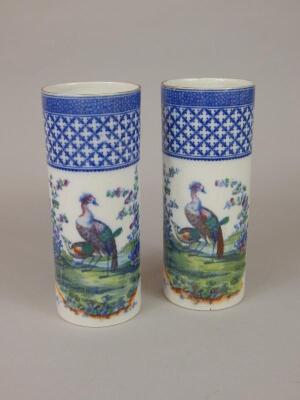 A pair of Corona Ware Chantilly pattern cylindrical vases